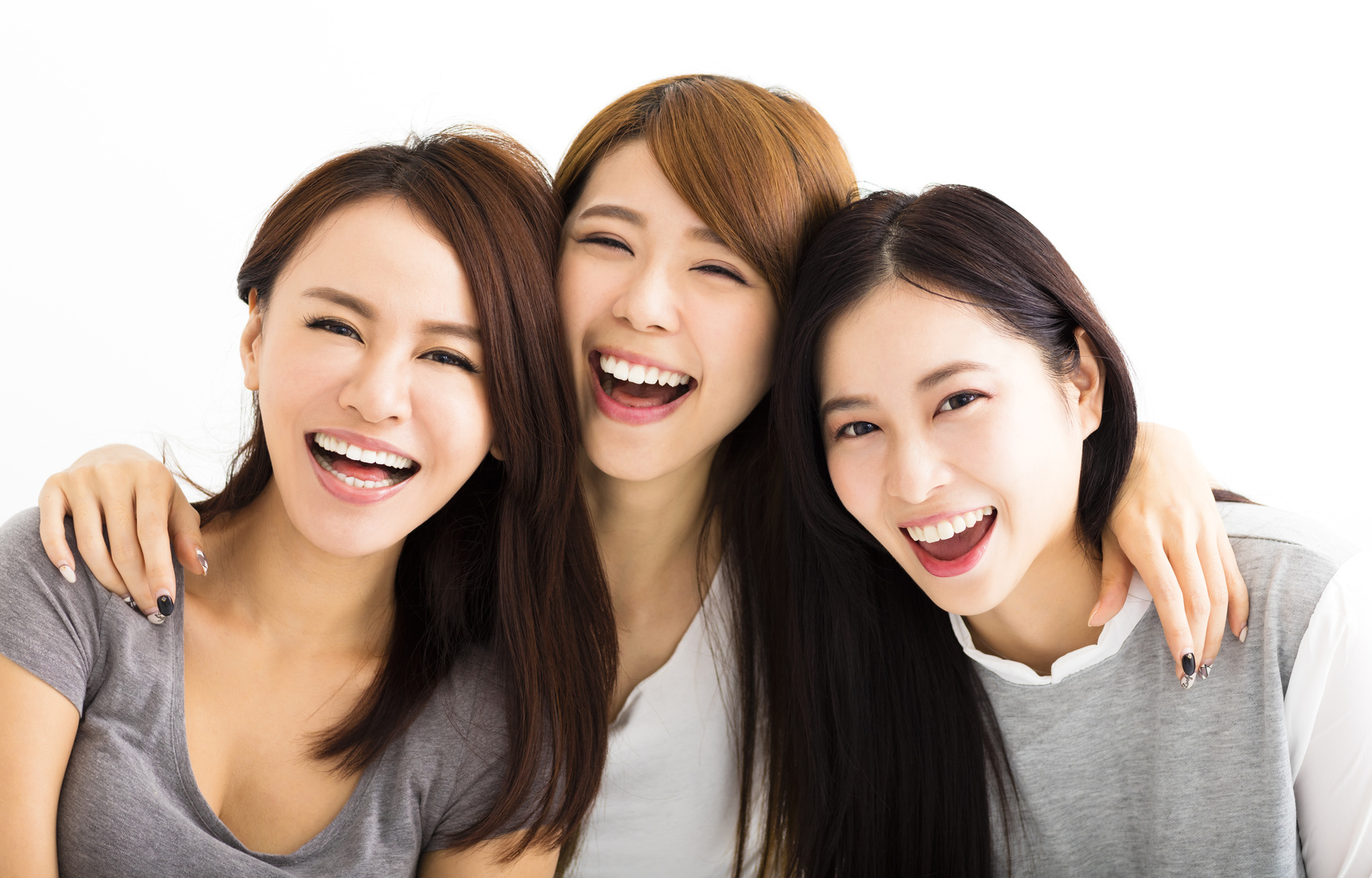 Closeup happy Young Women Faces Looking at Camera