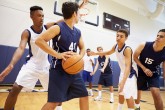 Male High School Basketball Team Playing Game