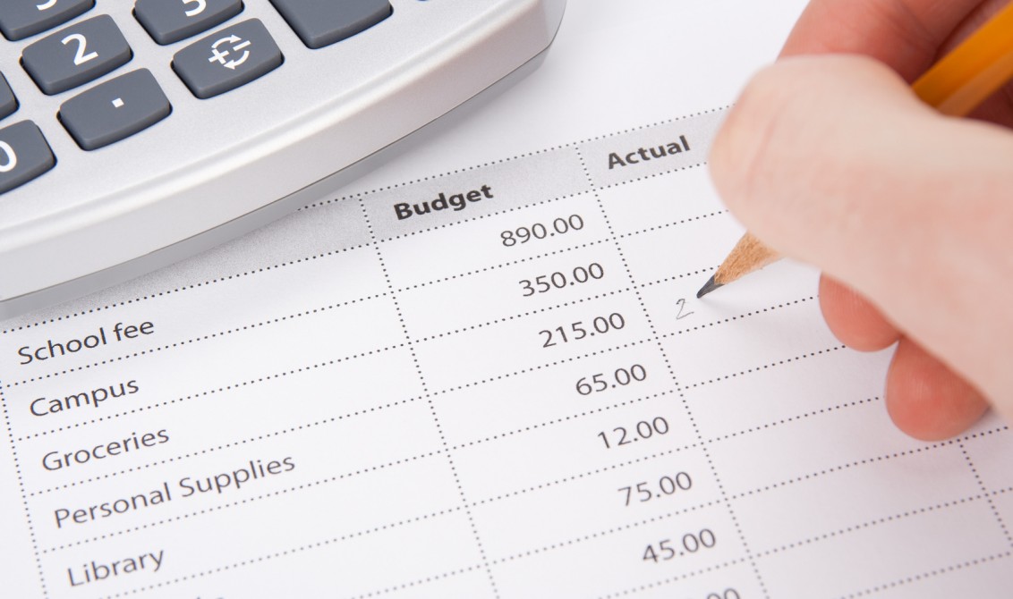 Student's budget concept - printed budget and student write in chart actual values.